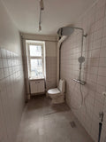 Montering af håndvaskarmatur, badeværelsesmøbel, brusearmatur og WC på Nørrebro